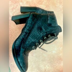 Black Heeled Boots with Lace-Up Design
